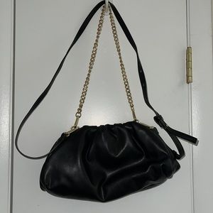 Black purse. Crossbody/ shoulder. Used. Good condition.